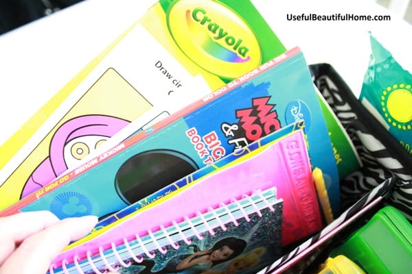 coloring and activity books inside busy bag