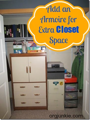add an armoire to your closet for extra storage space