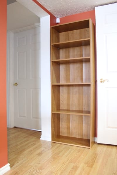 corner with empty bookcase