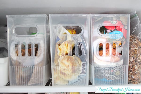 compact storage bins for organizing a top freezer
