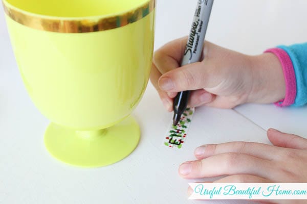 Even kids can label their own drinks using festive washi tape, how simple!