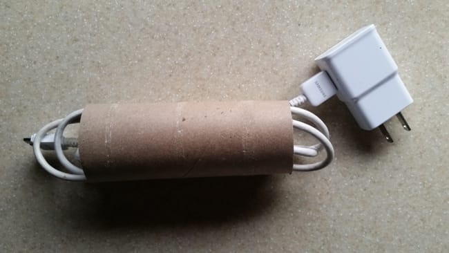 Use a toilet paper roll for cords 