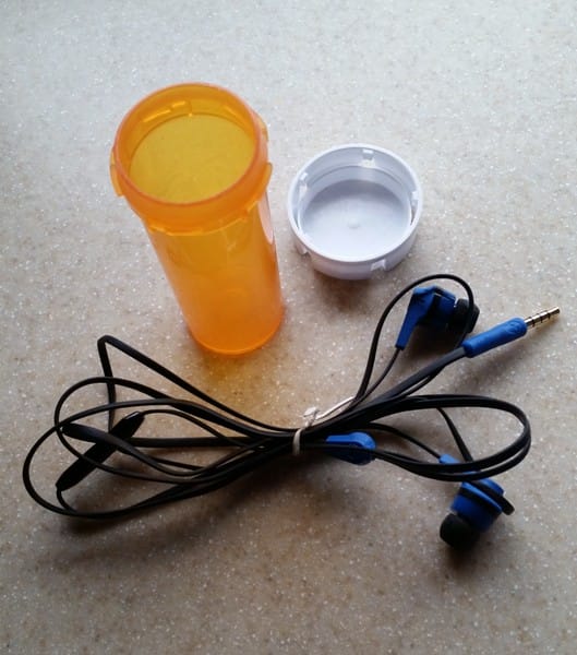 Use a pill bottle for headphones
